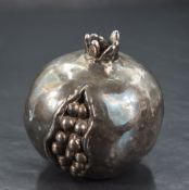 An Italian cast 980 grade white metal study of a pomegranate, marked 980 along with indistinct