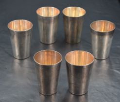 A set of six George VI silver stacking beakers, of plain tapering cylindrical form, with marks for