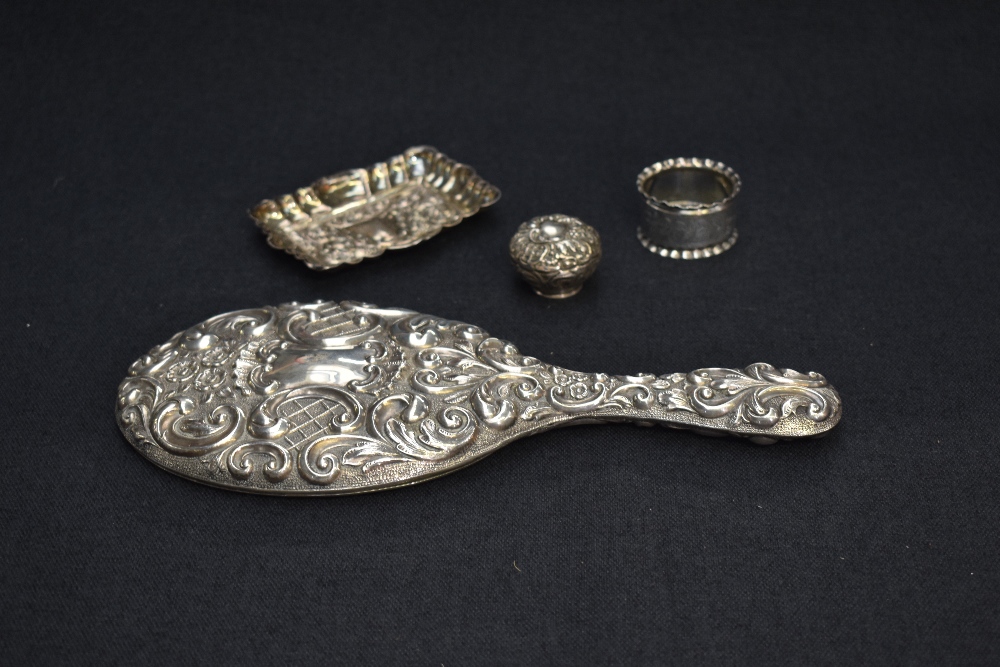 A late Victorian silver pin dish, of rectangular form with shaped outline and fluted booge, the