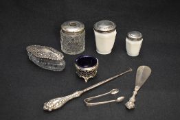 A group of mixed silver and silver topped items, to include two opaque glass dressing table jars,