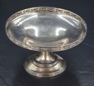 A George V silver pedestal dish, of dished circular form with short galleried rim, raised on a