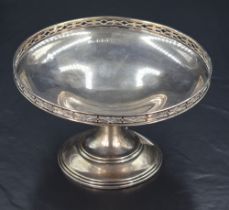 A George V silver pedestal dish, of dished circular form with short galleried rim, raised on a