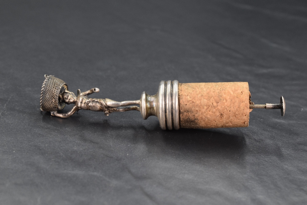 An imported Edwardian silver bottle stopper, of typical form with figural surmount formed as a