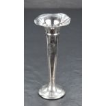 An Edwardian silver bud vase, of flared and tapering cylindrical form with moulded collar and