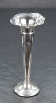 An Edwardian silver bud vase, of flared and tapering cylindrical form with moulded collar and