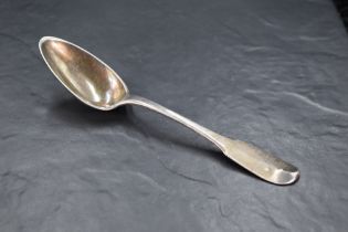 A late 18th/early 19th century French .950 grade 'silver' Hanoverian fiddle pattern spoon, nicely