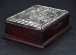 A Queen Elizabeth II silver mounted mahogany dressing table box, of hinged rectangular form, the