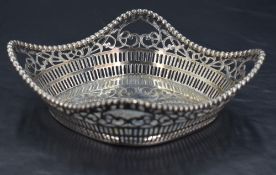 An Italian 800 grade white metal dish, of shaped square form with beaded moulded concaved rim and