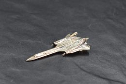 An unusual Queen Elizabeth II silver model of a Lockheed SR-71 Blackbird aircraft, most likely