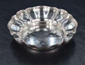 A Queen Elizabeth II silver dish, of shaped circular form, the booge embossed as petals and