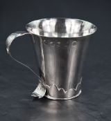 A Scottish Queen Elizabeth II silver cup, of flared cylindrical form with applied scroll handle