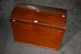 A late 19th/early 20th century stained pine silver chest, of domed and hinged rectangular form