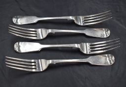 A set of four Victorian silver fiddle pattern forks, with Hanoverian terminals, marks for London