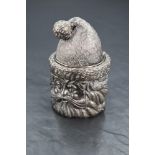 An Italian 980 grade white metal lidded box, embossed in the form of a bust of Father Christmas, his