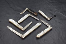 A group of three early 20th century silver bladed and Mother-of-Pearl mounted pocket or fruit