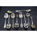 A group of mixed George III and Victorian silver spoons, various designs, ages and makers, gross