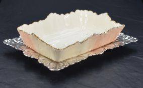 A late 19th/early 20th century Locke & Co Worcester blushed ivory porcelain dish with silver-