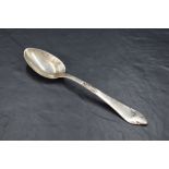 An attractive Danish silver spoon, the planished and foliate moulded stem with trefoil terminal,