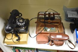 A vintage brown leather gentleman's travel set, a Kodak Retinette II B camera, Agfalux flash, and