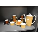 A Wedgwood Susie Cooper 'Nebula' design coffee service, comprising coffee pot, six coffee cups and