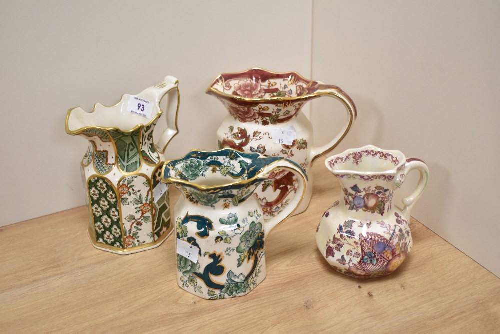 Four Masons Ironstone jugs, to include; Chartreuse, Mandalay Red, Appliqué and Fruit Basket.