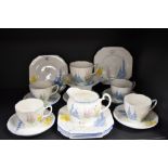 A vintage ABJ Grafton china tea set, to comprise teacups, saucers, sandwich plate, and milk jug