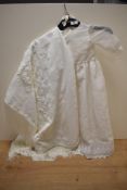 A vintage christening gown with shawl