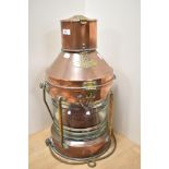 A Victorian copper and brass ship's masthead lantern, bearing plaque 'Not Under Command',