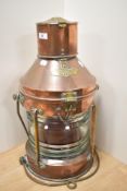 A Victorian copper and brass ship's masthead lantern, bearing plaque 'Not Under Command',
