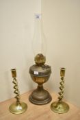 A late 19th Century brass Duplex oil lamp, with chimney, measuring 52cm tall, and a pair of twist