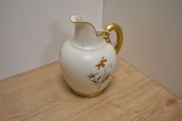 A Victorian Royal Worcester blush ivory jug, c.1890, hand painted with a butterfly and flower