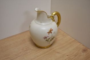 A Victorian Royal Worcester blush ivory jug, c.1890, hand painted with a butterfly and flower