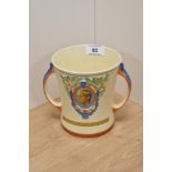 An Edward VIII 1936 coronation mug, having wind up musical mechanism to base, AF