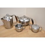 An assorted collection of Cavalier stainless steel tableware, comprising coffee pot, tea pot, milk