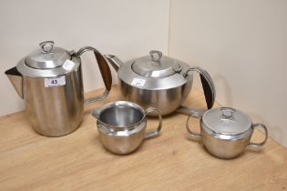 An assorted collection of Cavalier stainless steel tableware, comprising coffee pot, tea pot, milk