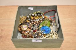 A box of costume jewellery and accessories, to include beaded necklaces