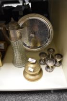 A set of sliver plated egg cups with stand, a vintage pressed glass and metal decanter, an Indian