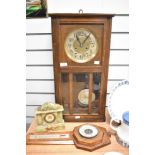 An early 20th century oak cased wall clock, an onyx mantel clock and a barometer.