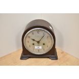 A 1930s bakelite cased mantel clock, Enfield, Made in England.