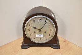 A 1930s bakelite cased mantel clock, Enfield, Made in England.