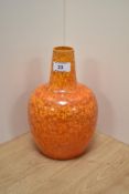 An early 20th Century Royal Lancastrian pottery vase, of ovoid form, decorated in an orange