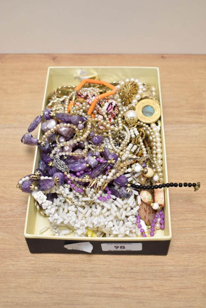 A collection of vintage and modern costume jewellery.