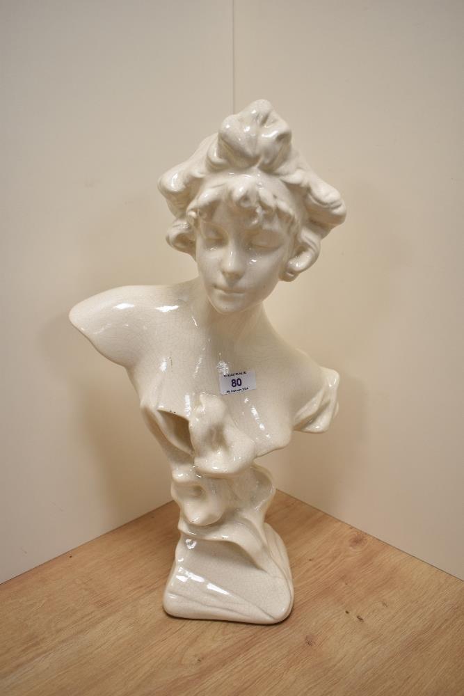 A modern classically styled moulded ceramic bust of female form, having crackle effect glaze, approx