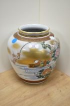 A Japanese Satsuma ware vase, of rounded form, and decorated with Peking ducks and chrysanthemum