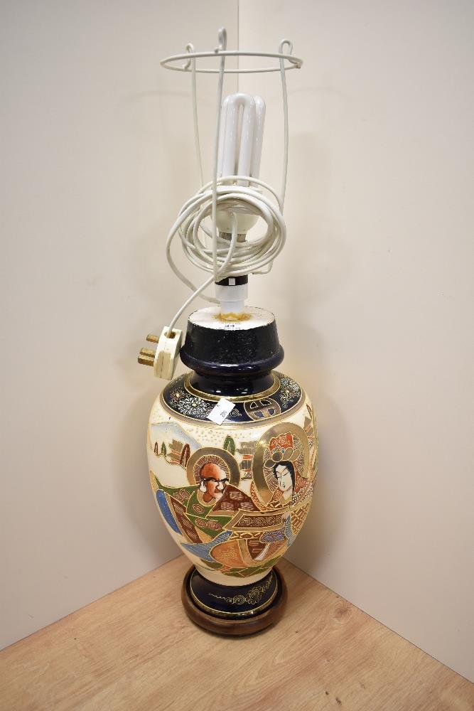 An early 20th Century Japanese Satsuma ware porcelain vase converted into a lamp base, raised on a - Image 2 of 2