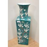 A 20th Century Chinese green glazed vase, of squared form, decorated with exotic birds and blossoms,