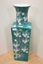 A 20th Century Chinese green glazed vase, of squared form, decorated with exotic birds and blossoms,