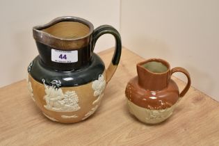 An early 20th Century Doulton Lambeth harvest jug, with applied silver rim, London 1904, and strap