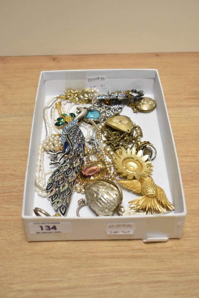 An assorted collection of costume jewellery, to include a white metal and enamelled peacock