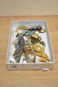 An assorted collection of costume jewellery, to include a white metal and enamelled peacock